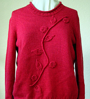 Pullover mit gestrickten Applikationen